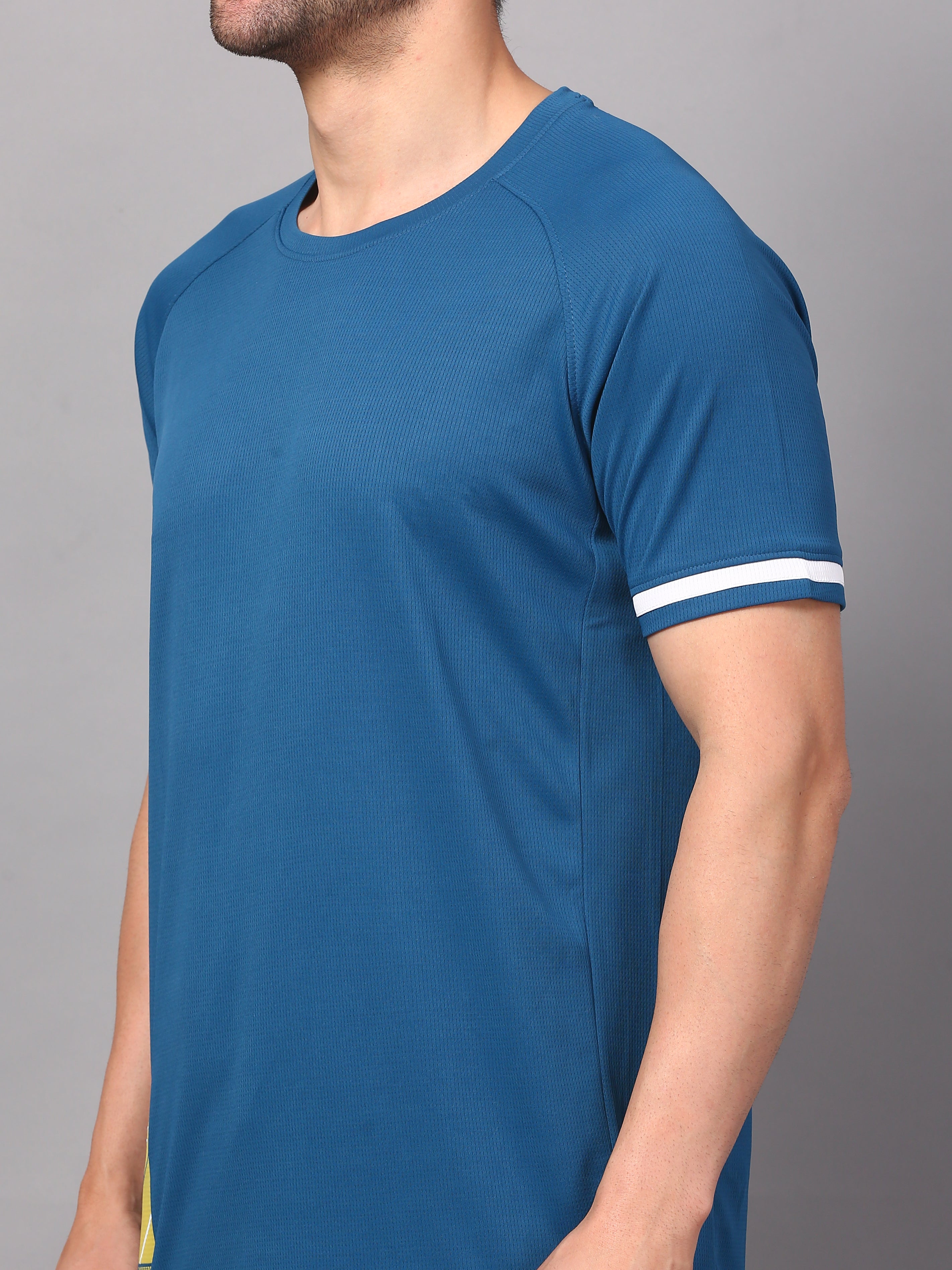 Person wearing a blue t-shirt with white trim 