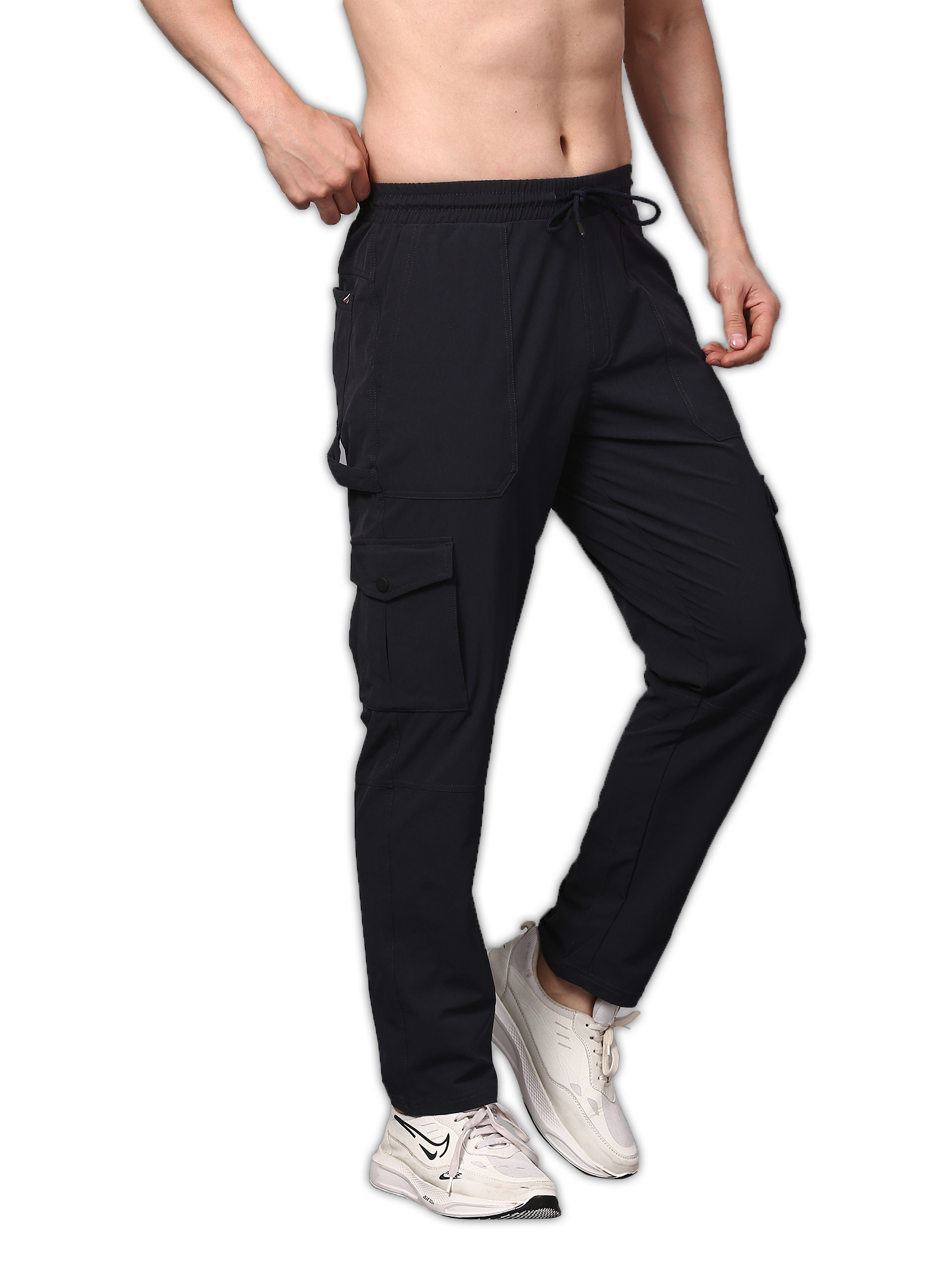 Black cargo pants worn by a person on a white background