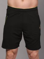 Black shorts with green accents 