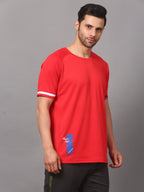 Man wearing a red sports jersey with a logo 