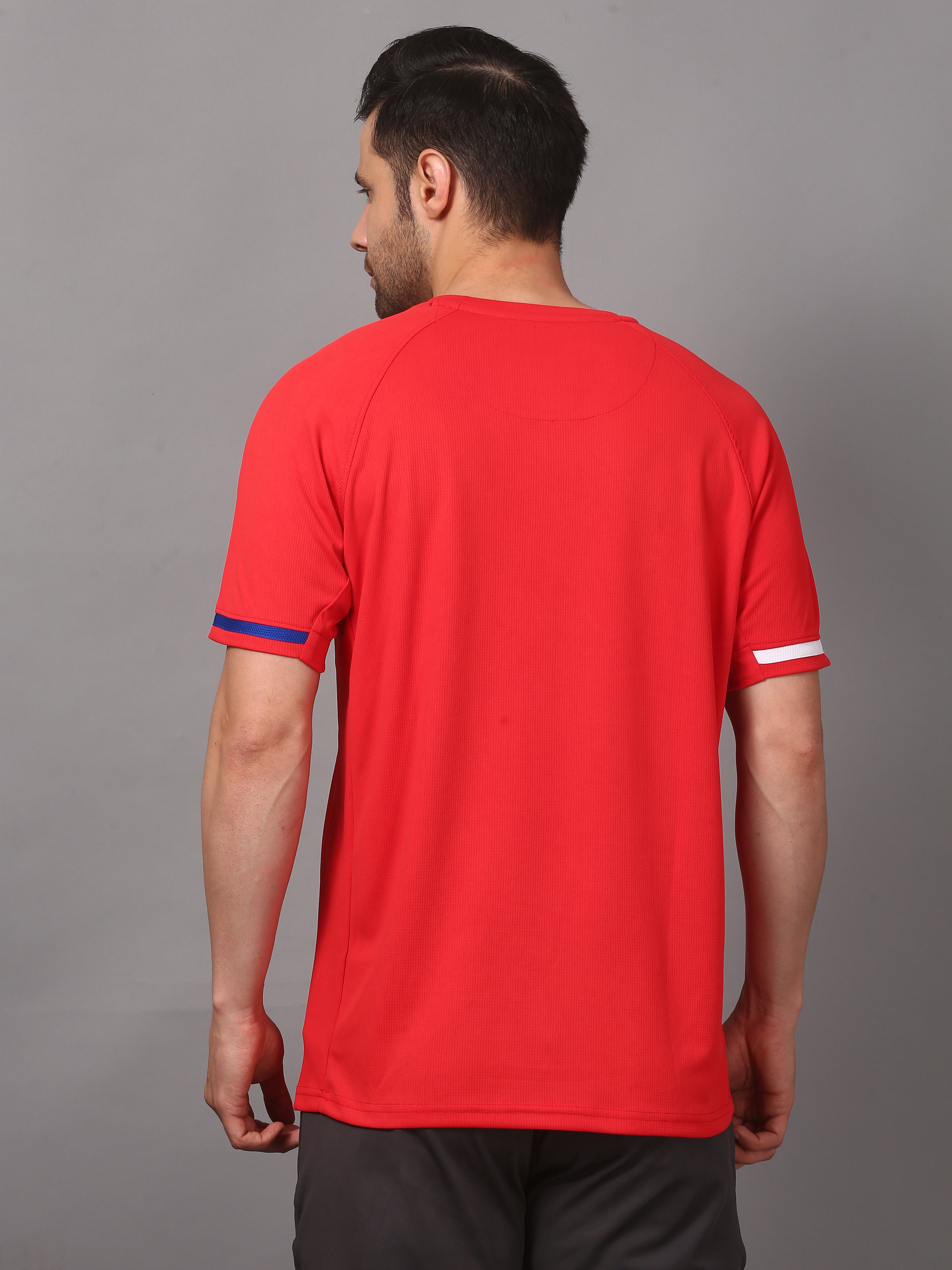 Man wearing a red t-shirt with white and blue accents 