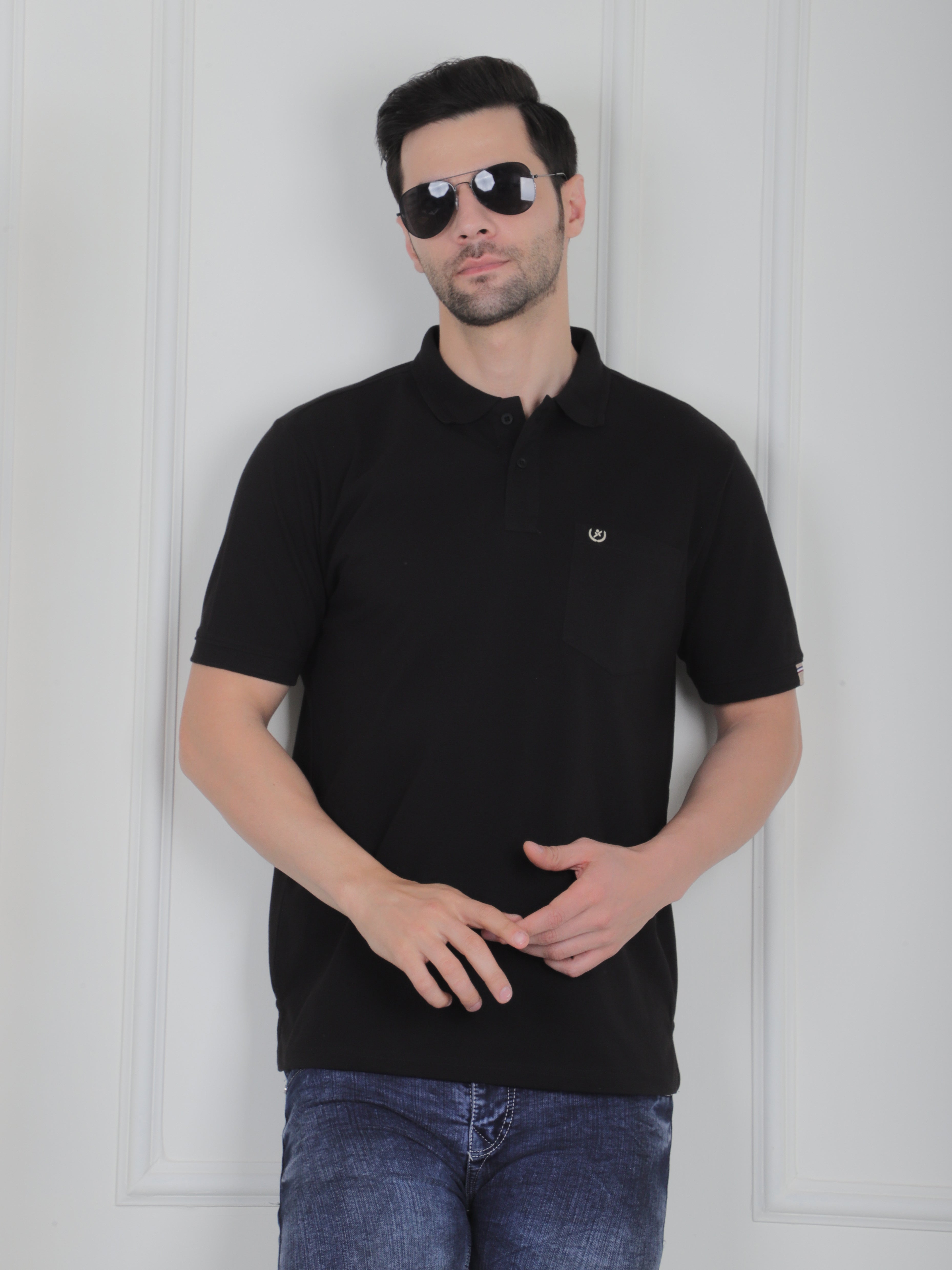 Man wearing a black polo shirt
