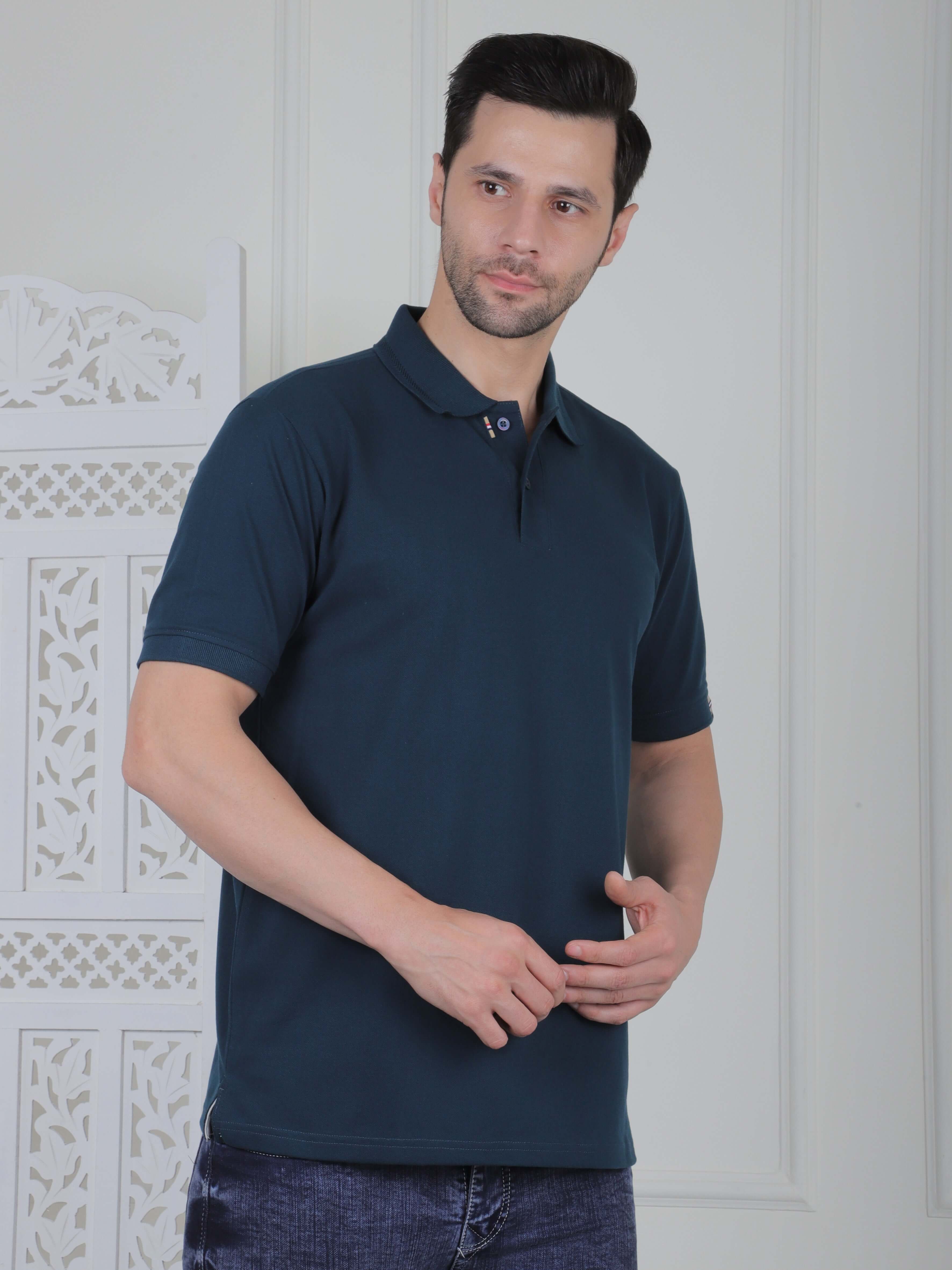 Men's polo T-shirt in dark teal, featuring a collared neckline and button placket, perfect for casual or smart casual wear.