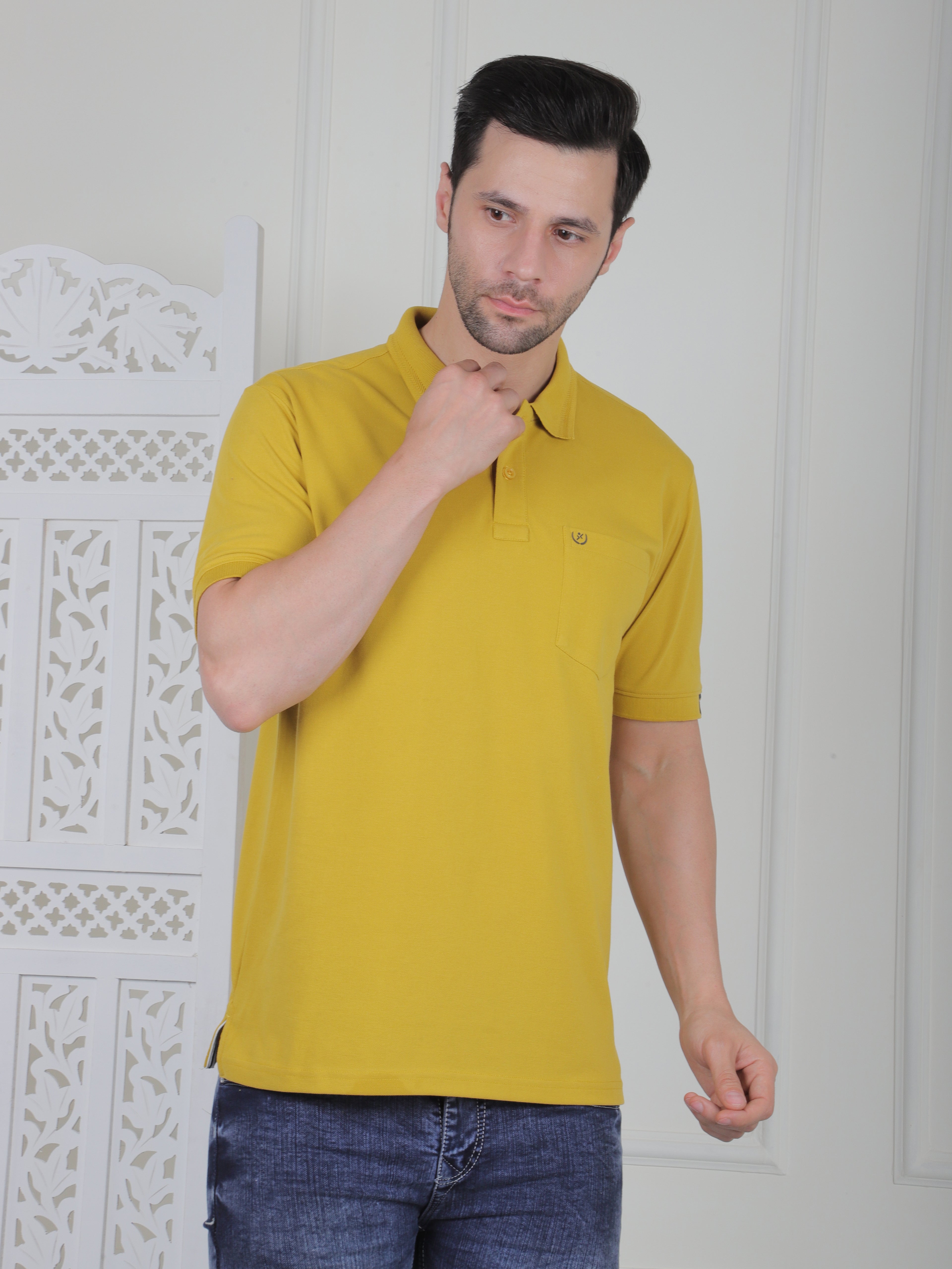 Man wearing a mustard polo shirt