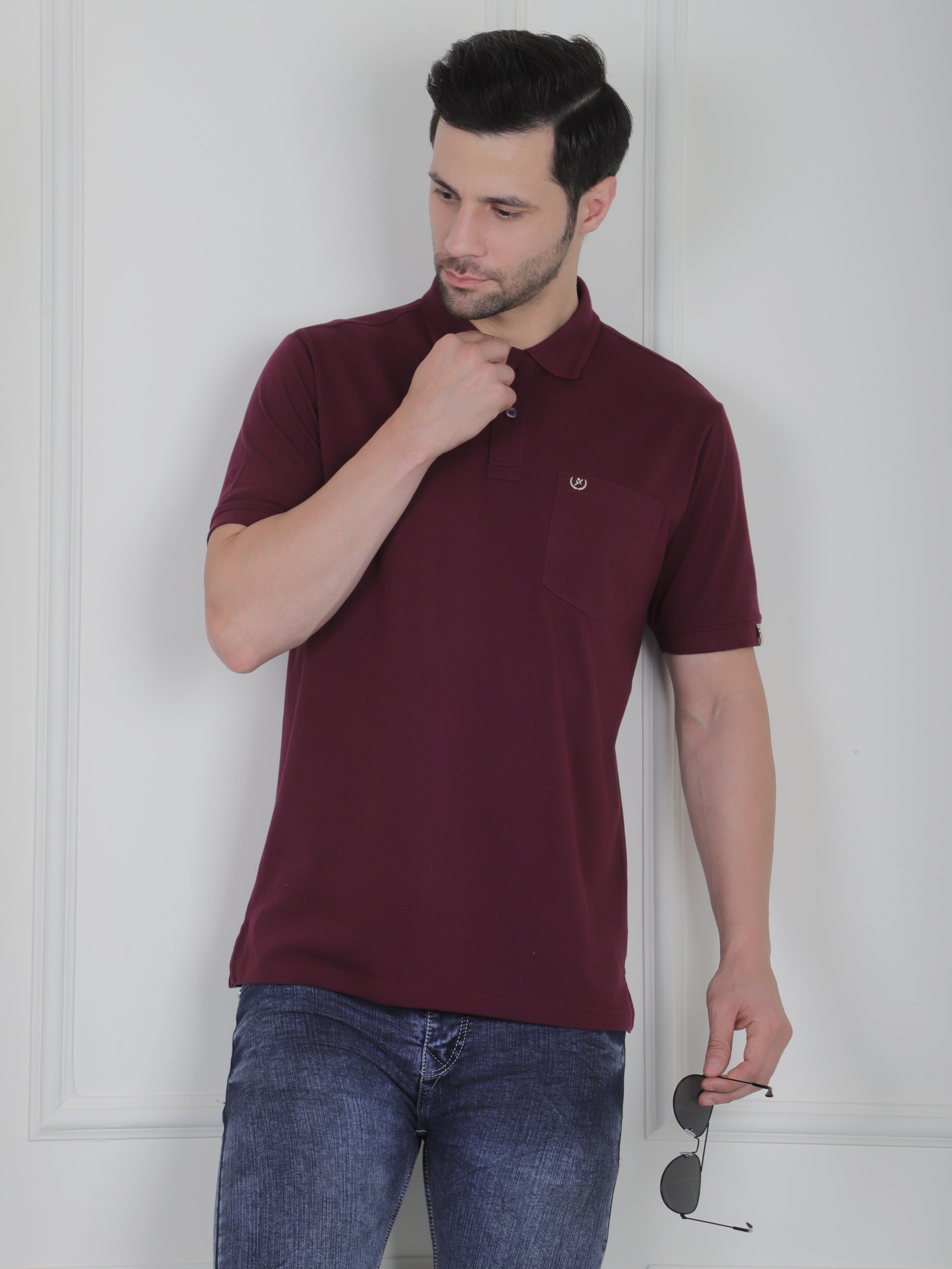 Man wearing a wine polo shirt