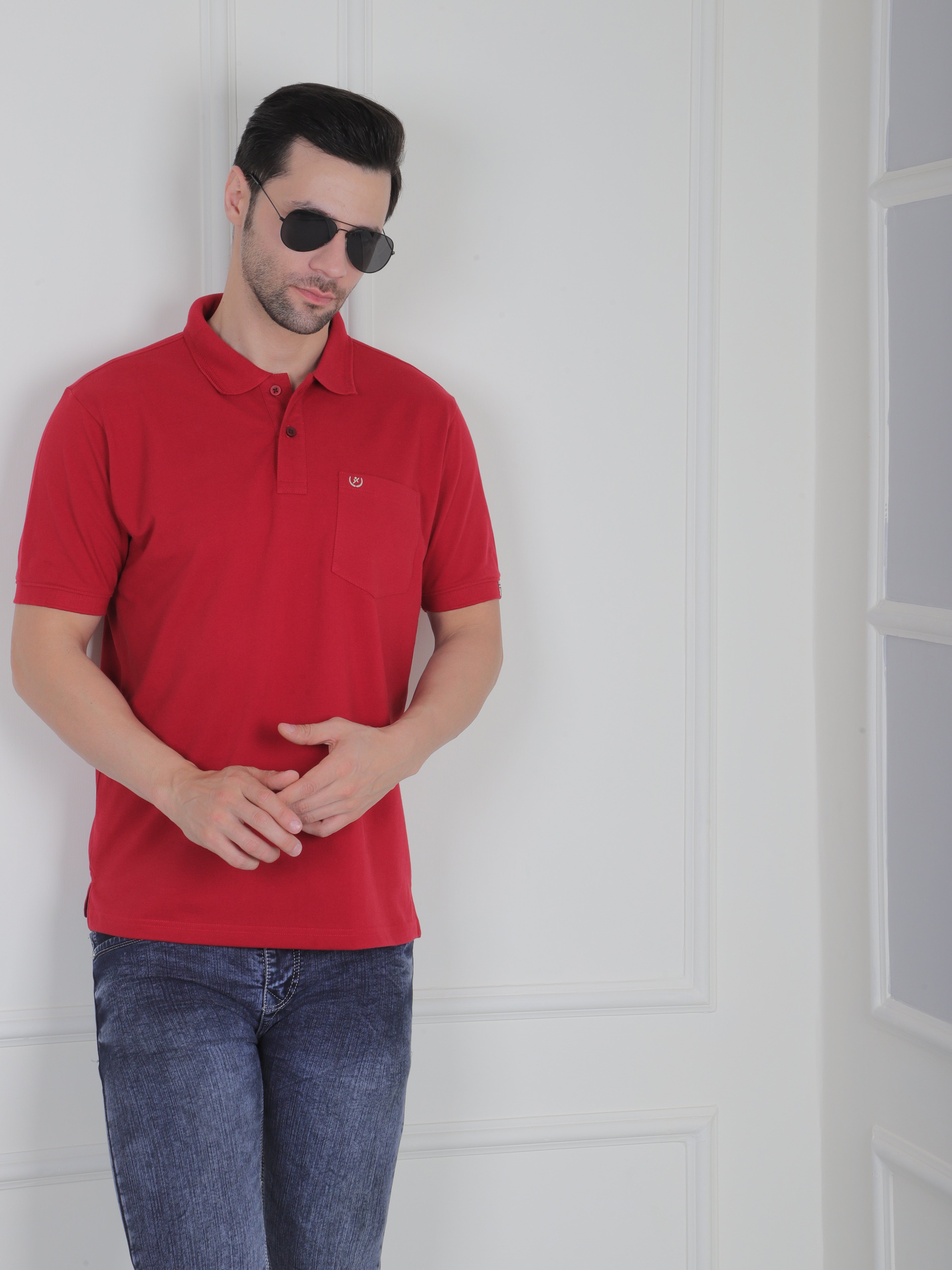 Man wearing a maroon polo shirt