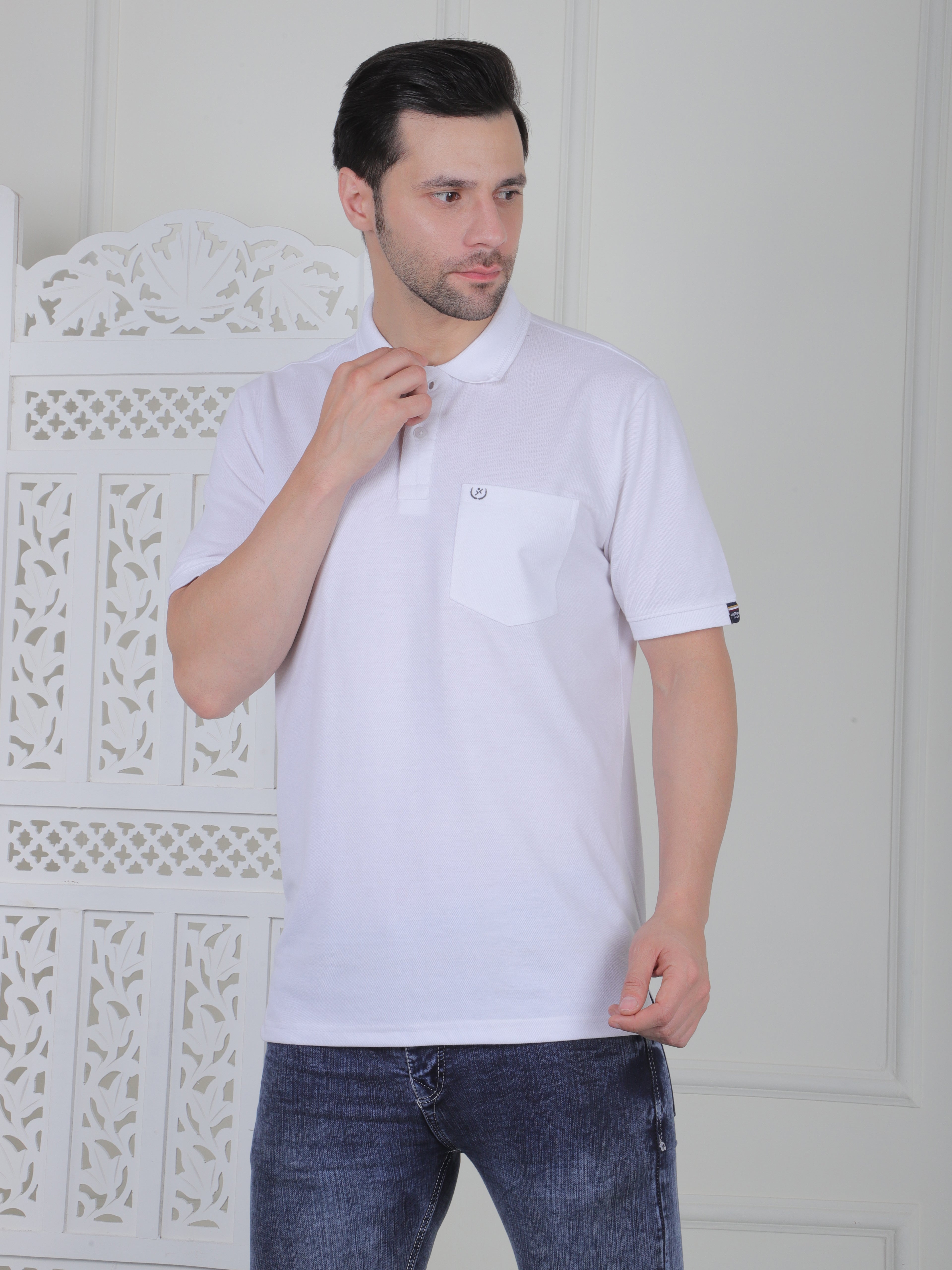 A white polo shirt with pockets