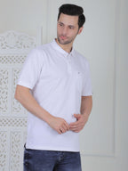 A white polo shirt with pockets