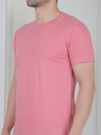 man wearing a pink everyday basic tshirt