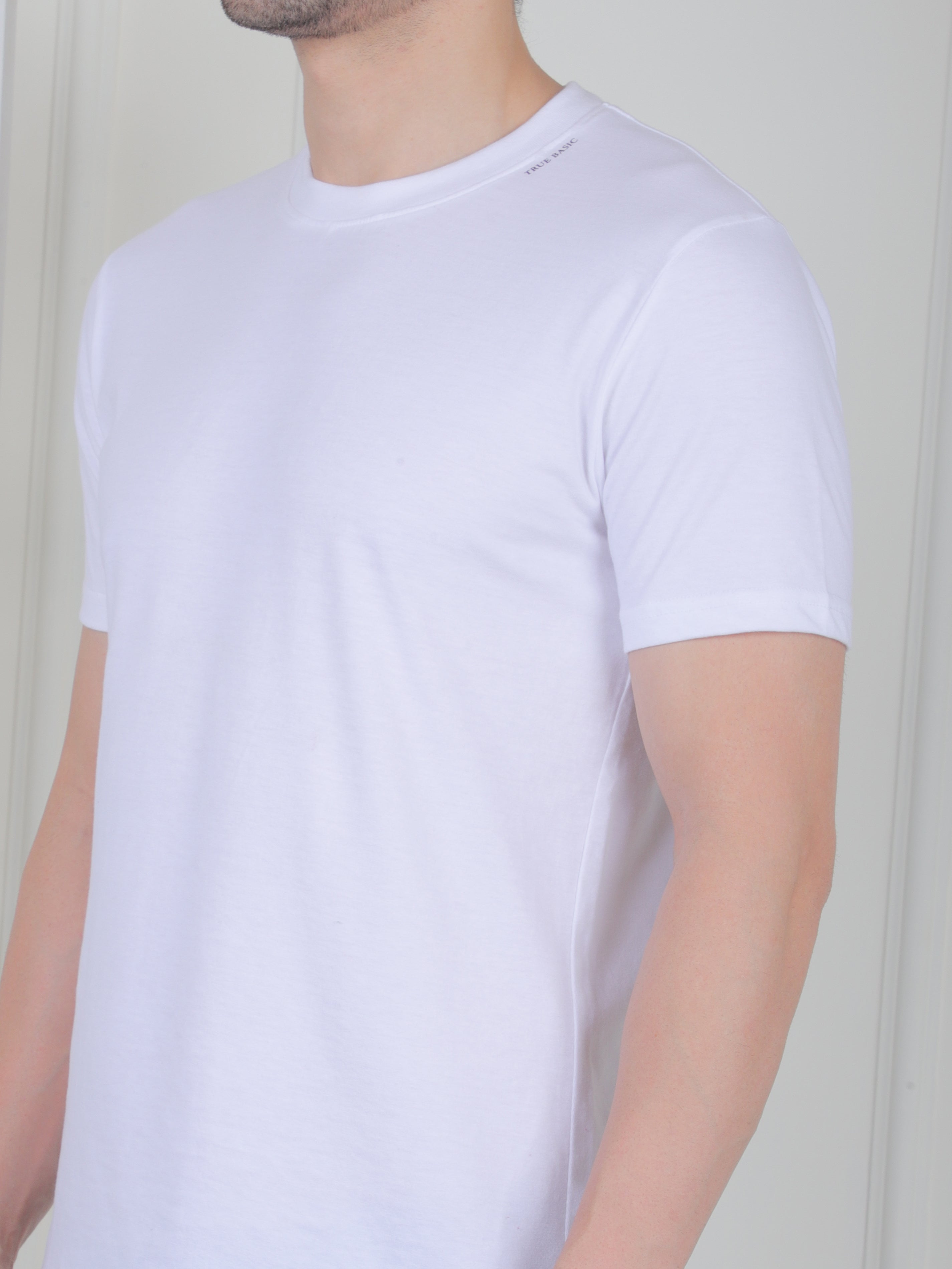 man wearing a white everyday basic tshirt