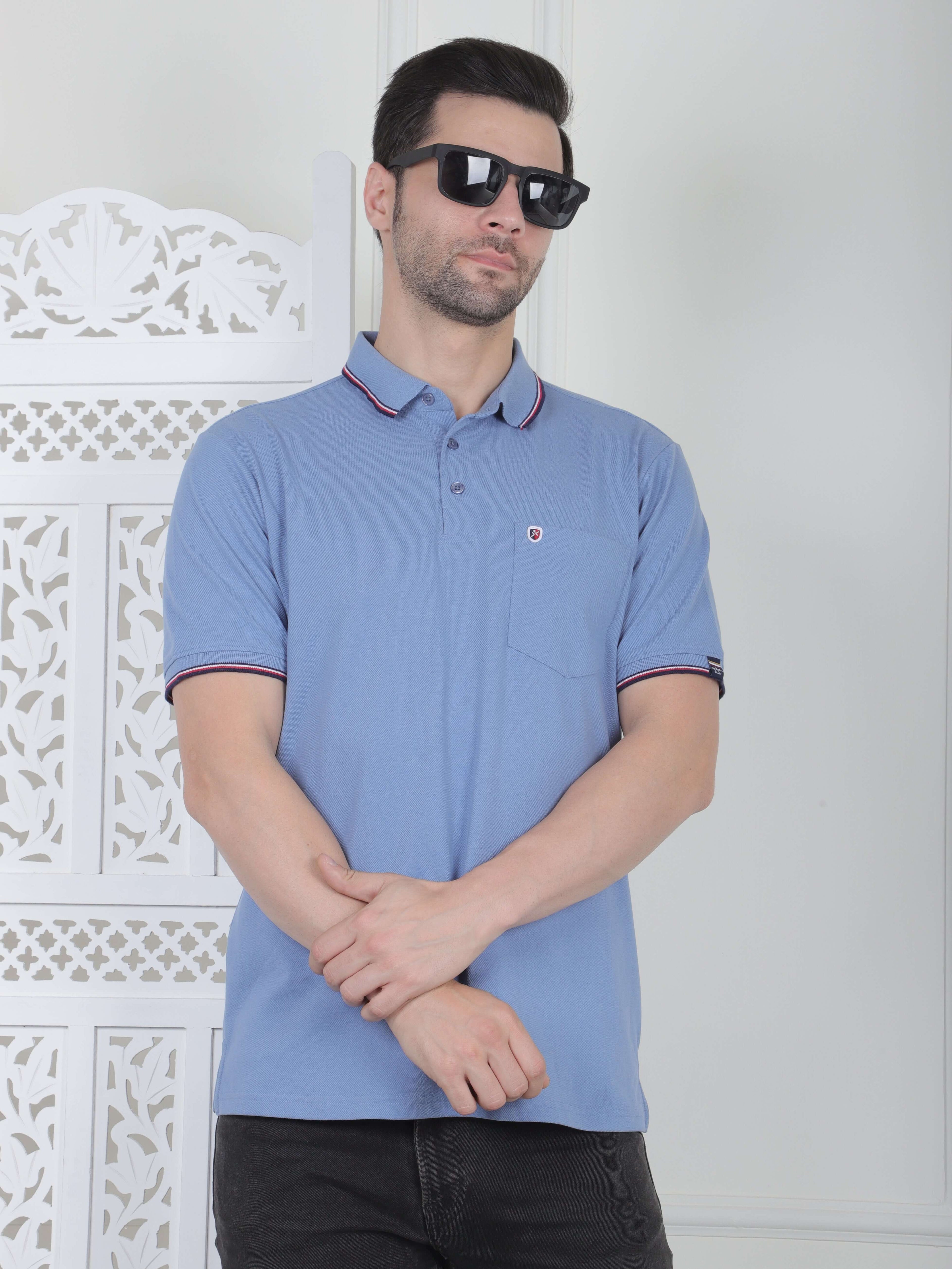 A sky polo shirt with pocket and piping details