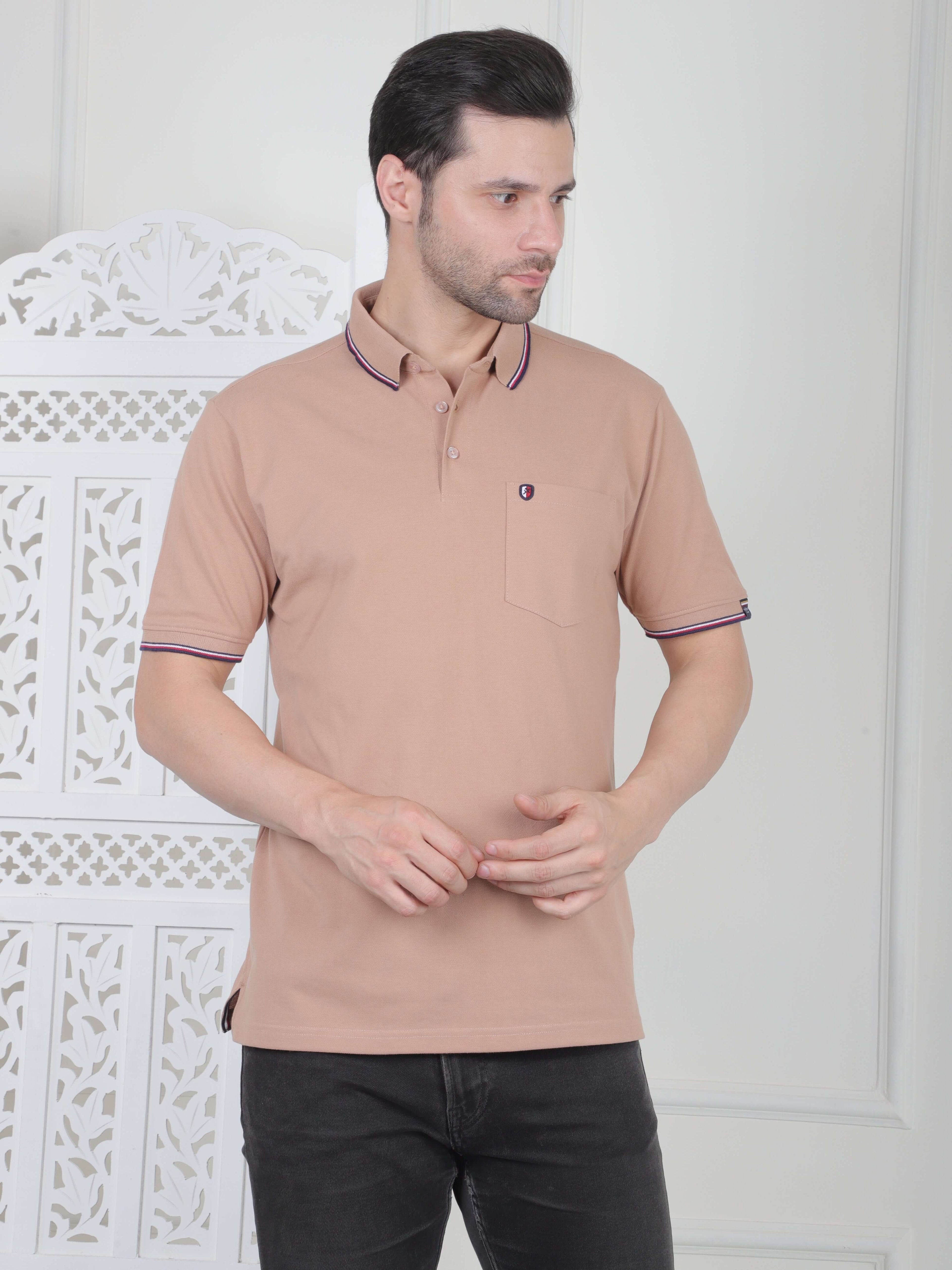 A rust beige polo shirt with pocket and piping details
