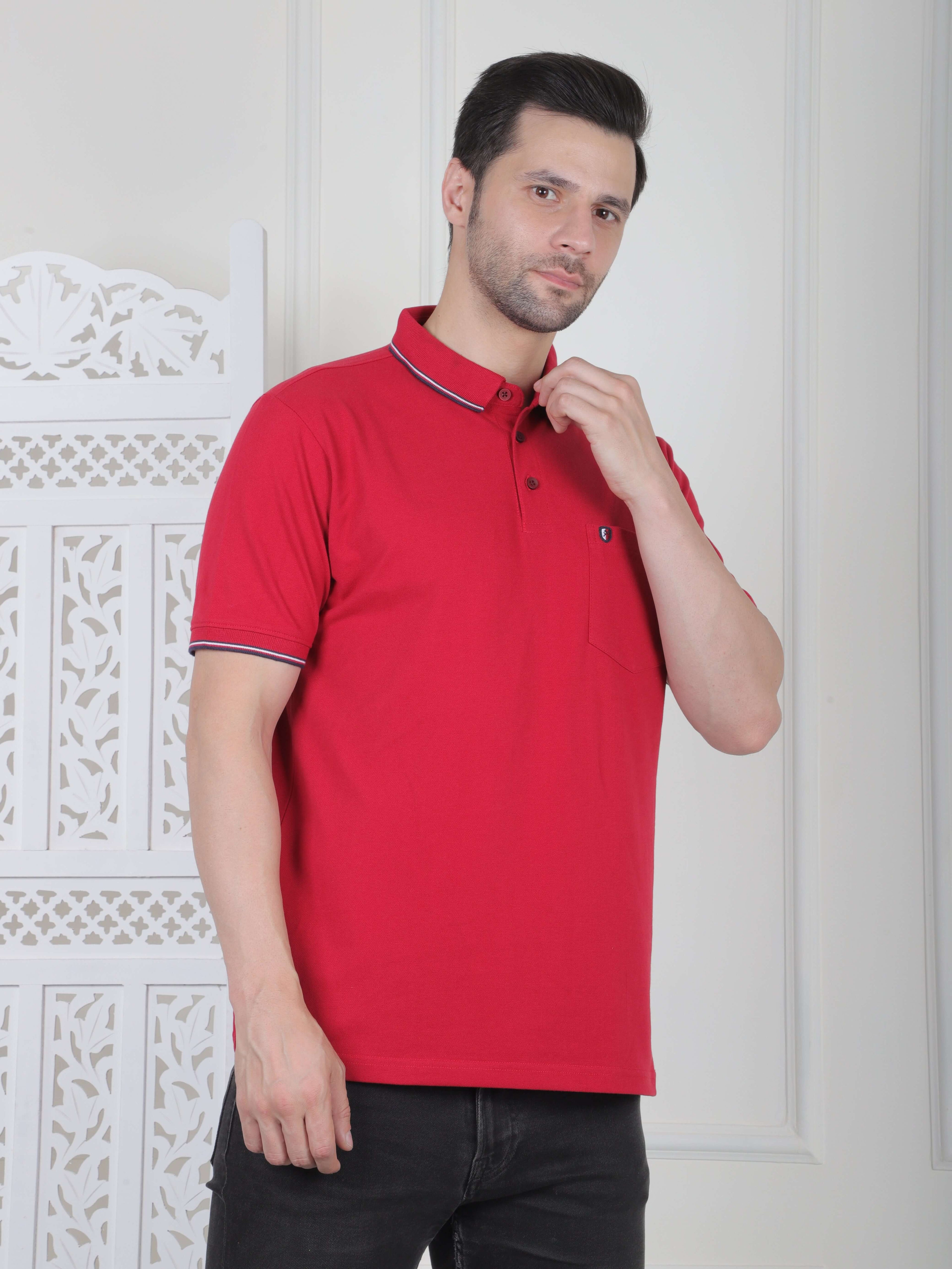 A maroon polo shirt with pocket and piping details
