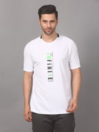 A man wearing a white round neck T-shirt with text on it, standing against a grey background.